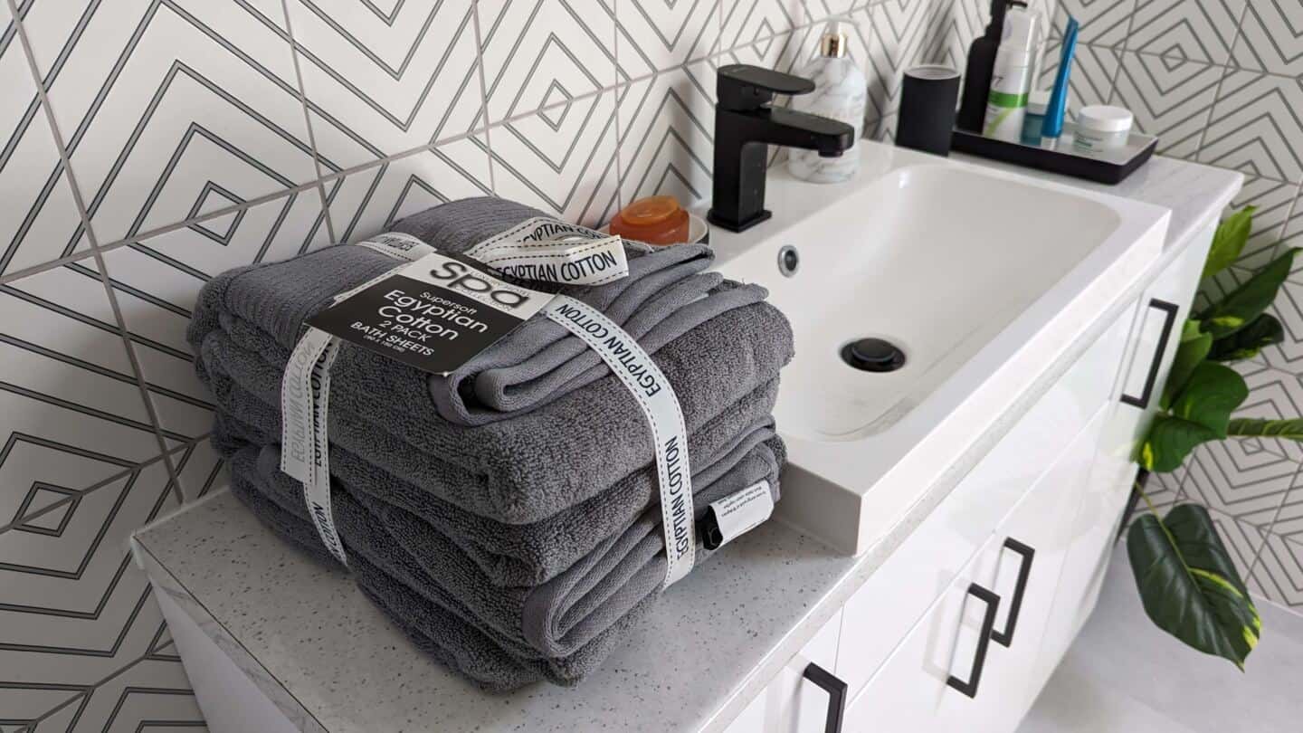 Egytian Cotton Bath Towels bundle in top of a bathroom vanity unit