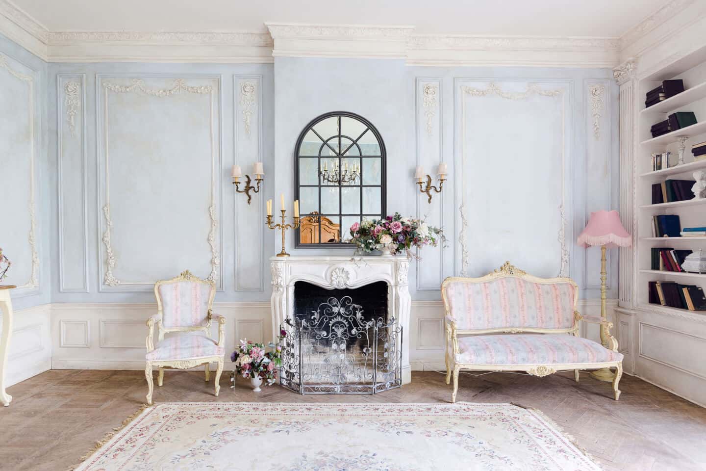 8 ways to use mirrors in your interiors. Casa Chic Boutique window mirror in black hung above the fireplace in a french chateau style interior.