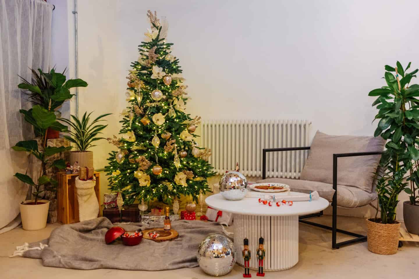 A Christmas scene featuring a realistic artificial Christmas tree from Balsam Hill