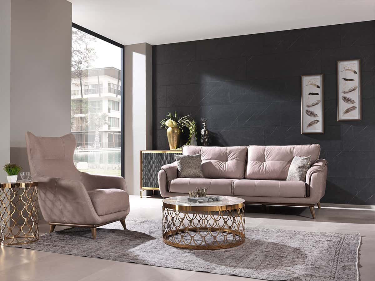 How to choose the perfect sofa for your lifestyle. Sofa and chair arranged around a rug with coffee table on top.