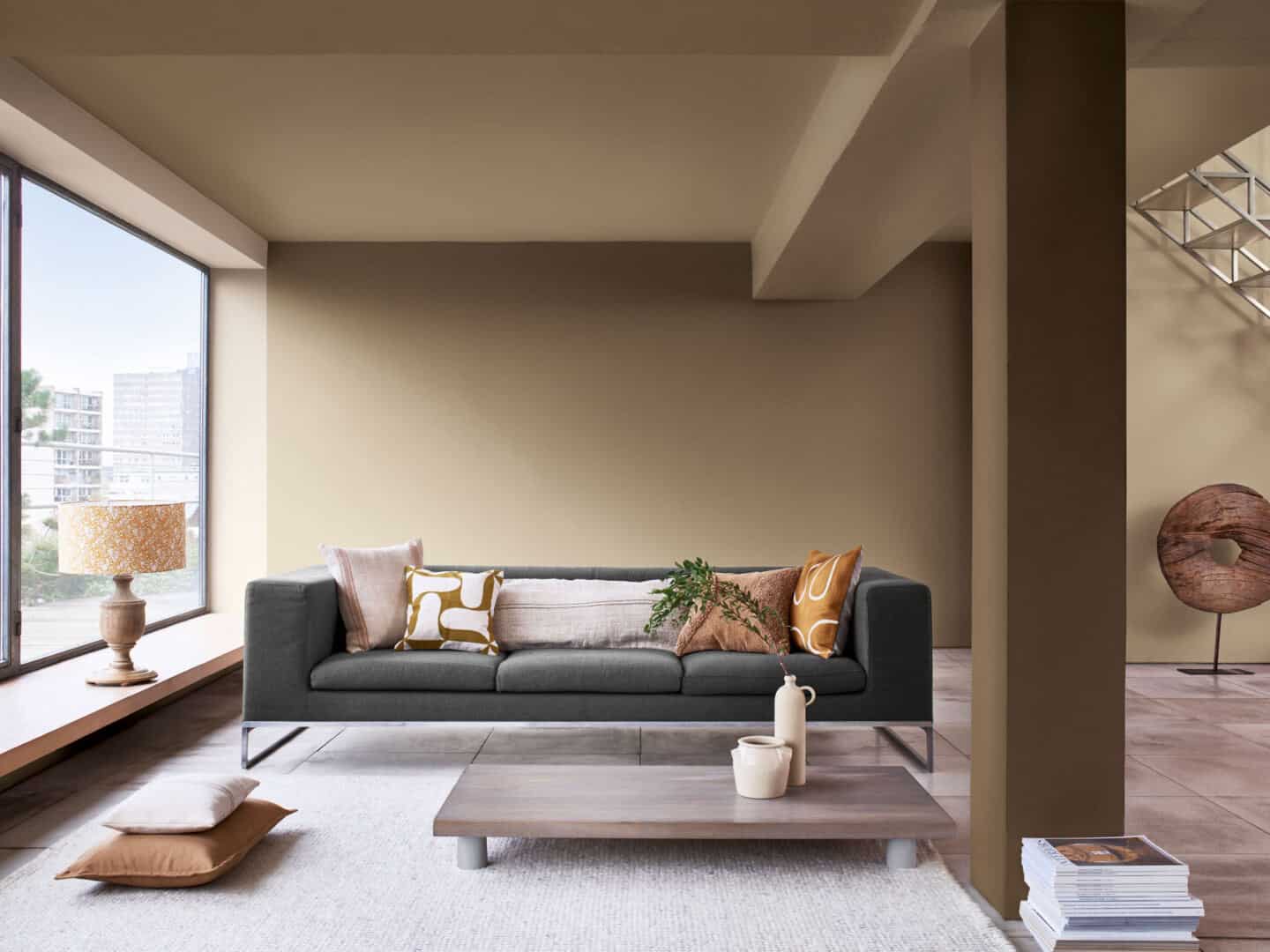 A modern livingroom painted in Brave Ground paint by Dulux.