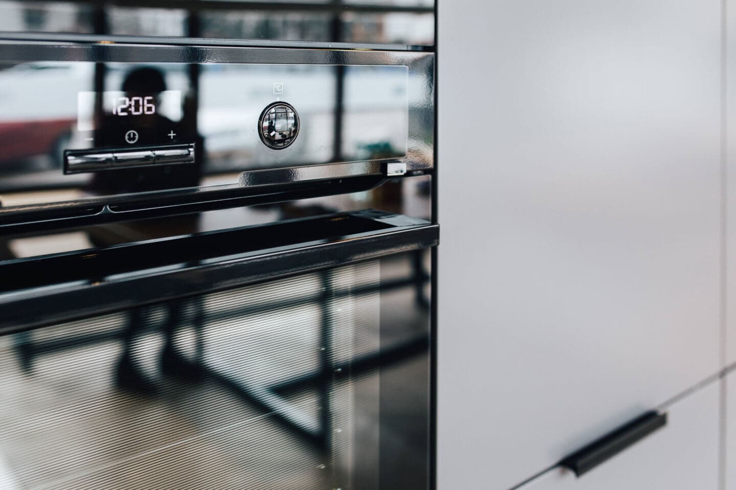Close up of an oven showing the clock
