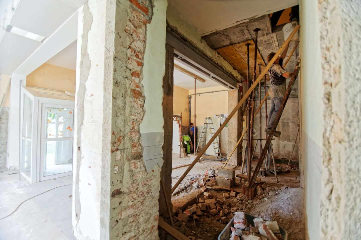 A man carrying out structural work in a home