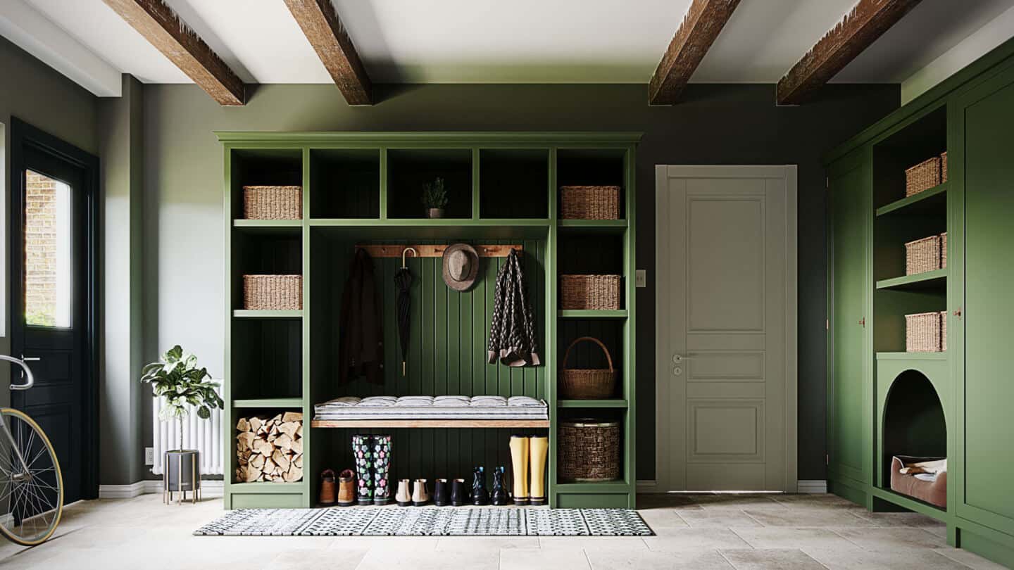 A boot room in a large open hallway with built-in wall shelving