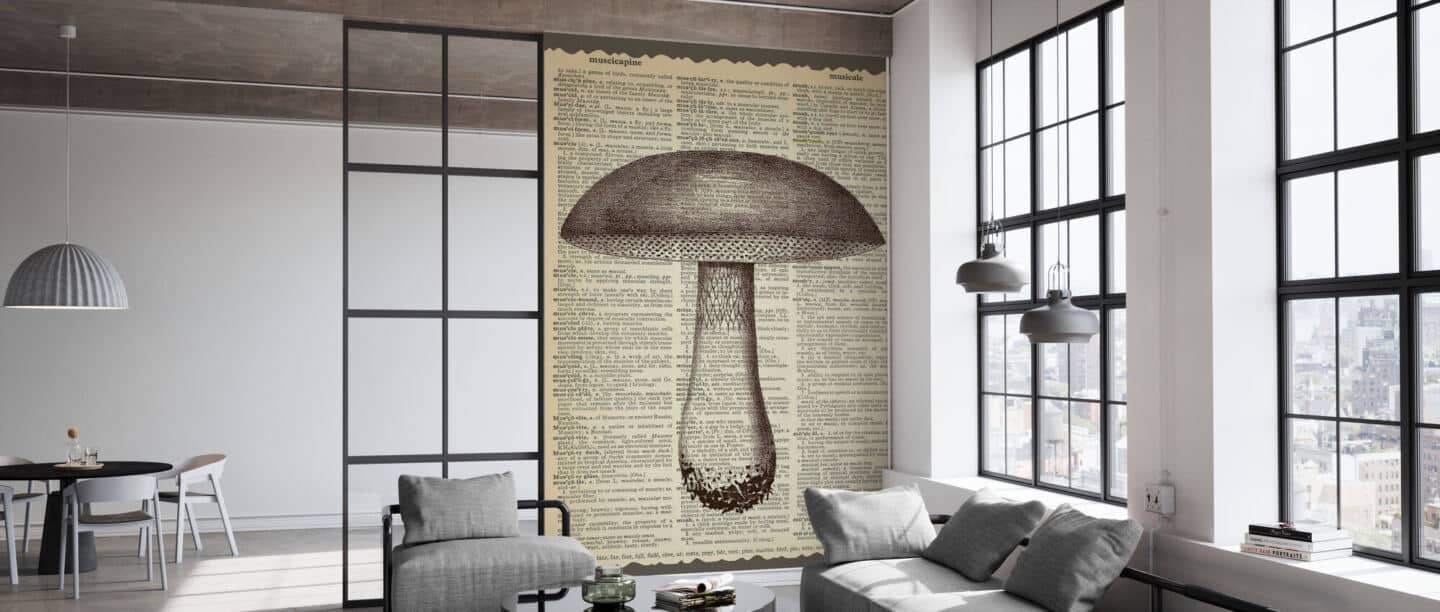 A living room in an industrial building features a large wall mural depicting a mushroom on newsprint