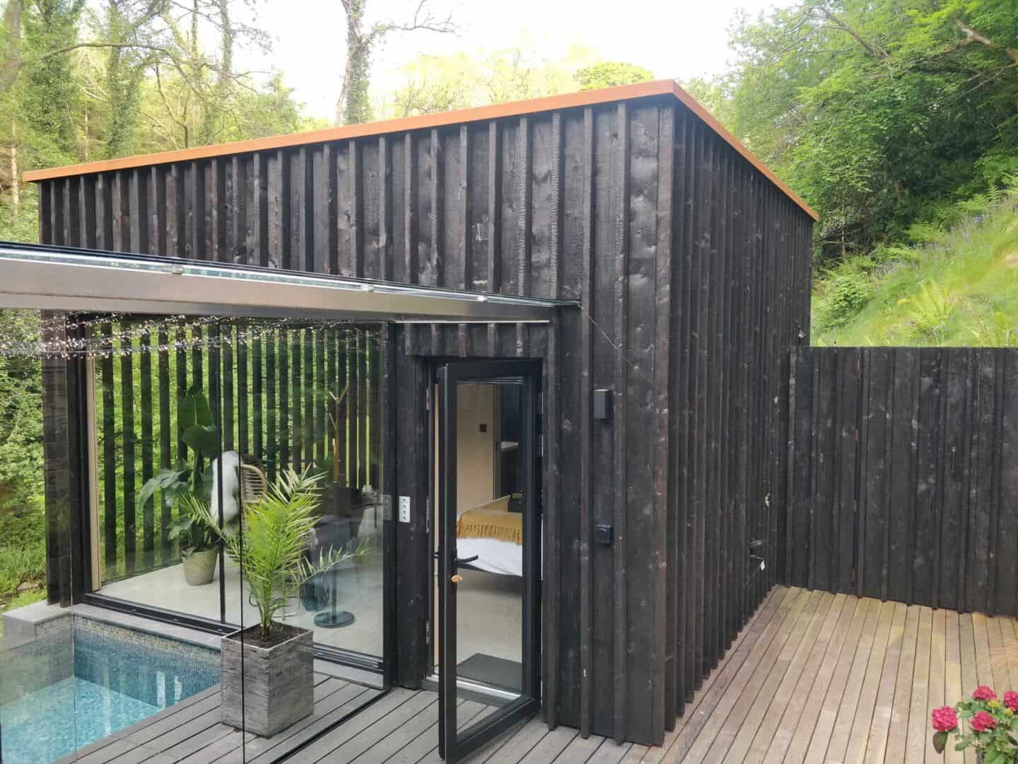 Wildwood Spa in North Devon is clad in black timber which has been treated using the Japanese technique Shou Sugi Ban